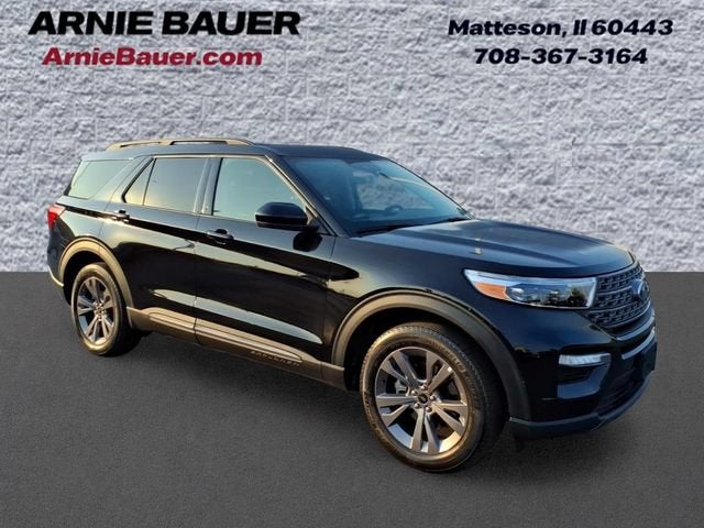 2022 Ford Explorer XLT in Agate Black Metallic — front three-quarter view