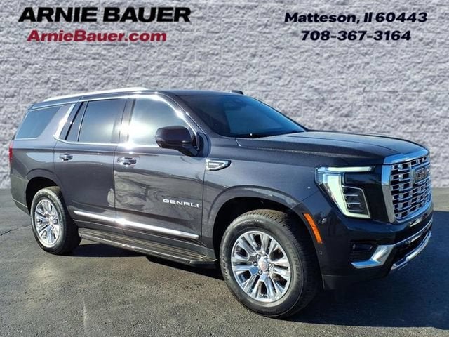 2025 GMC Yukon Denali in Titanium Rush Metallic — front three-quarter view