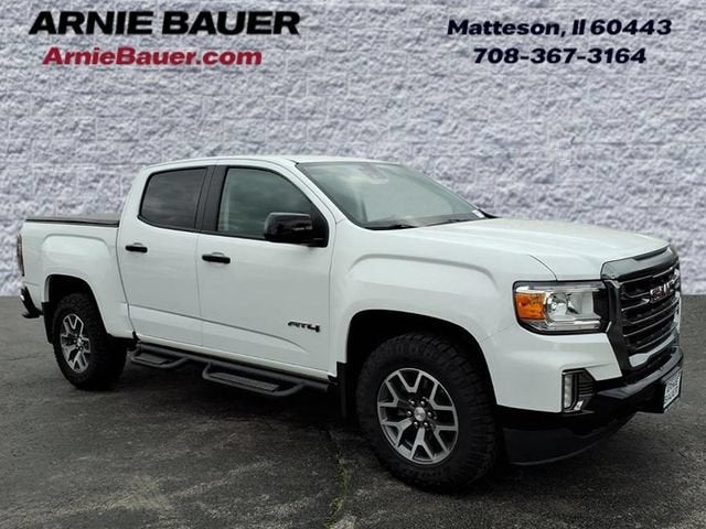 2021 GMC Canyon 4WD AT4 w/Leather in Summit White — front three-quarter view