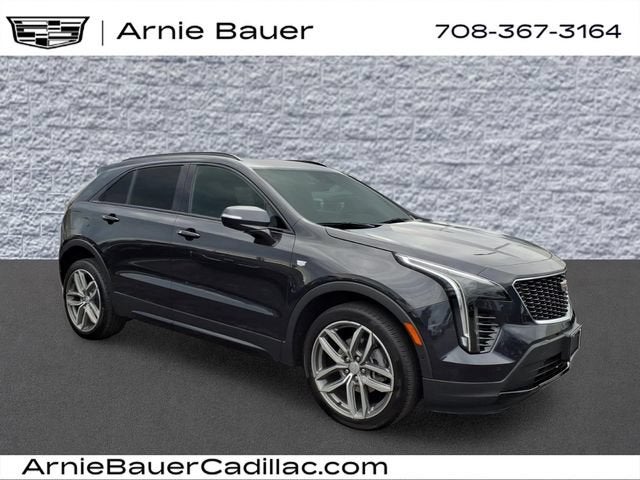 2023 Cadillac XT4 Sport in Galactic Grey Metallic — front three-quarter view
