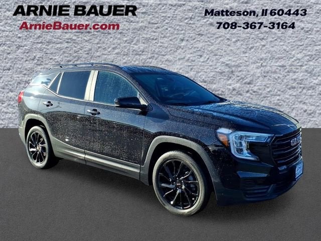 2024 GMC Terrain SLE in Ebony Twilight Metallic — front three-quarter view