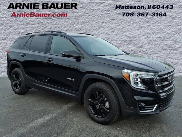 2024 GMC Terrain AT4 in Ebony Twilight Metallic — front three-quarter view