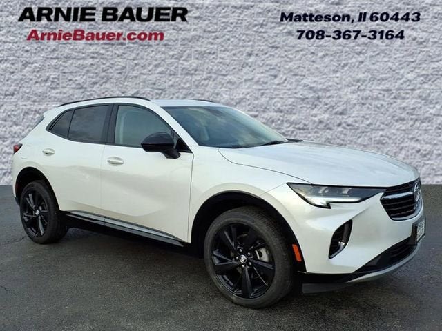 2023 Buick Envision Essence in White Frost Tricoat — front three-quarter view