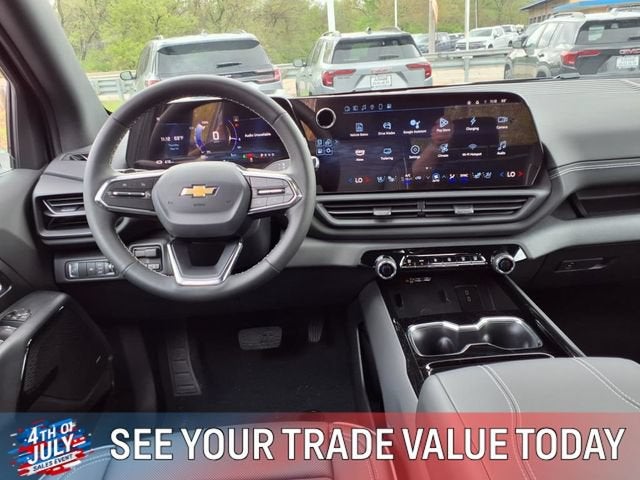 2025 Chevrolet Silverado EV — rear three-quarter view