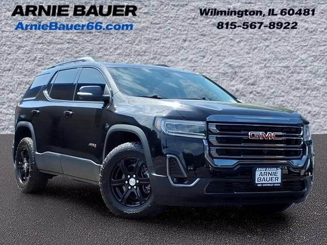 2023 GMC Acadia AT4 in Ebony Twilight Metallic — front three-quarter view